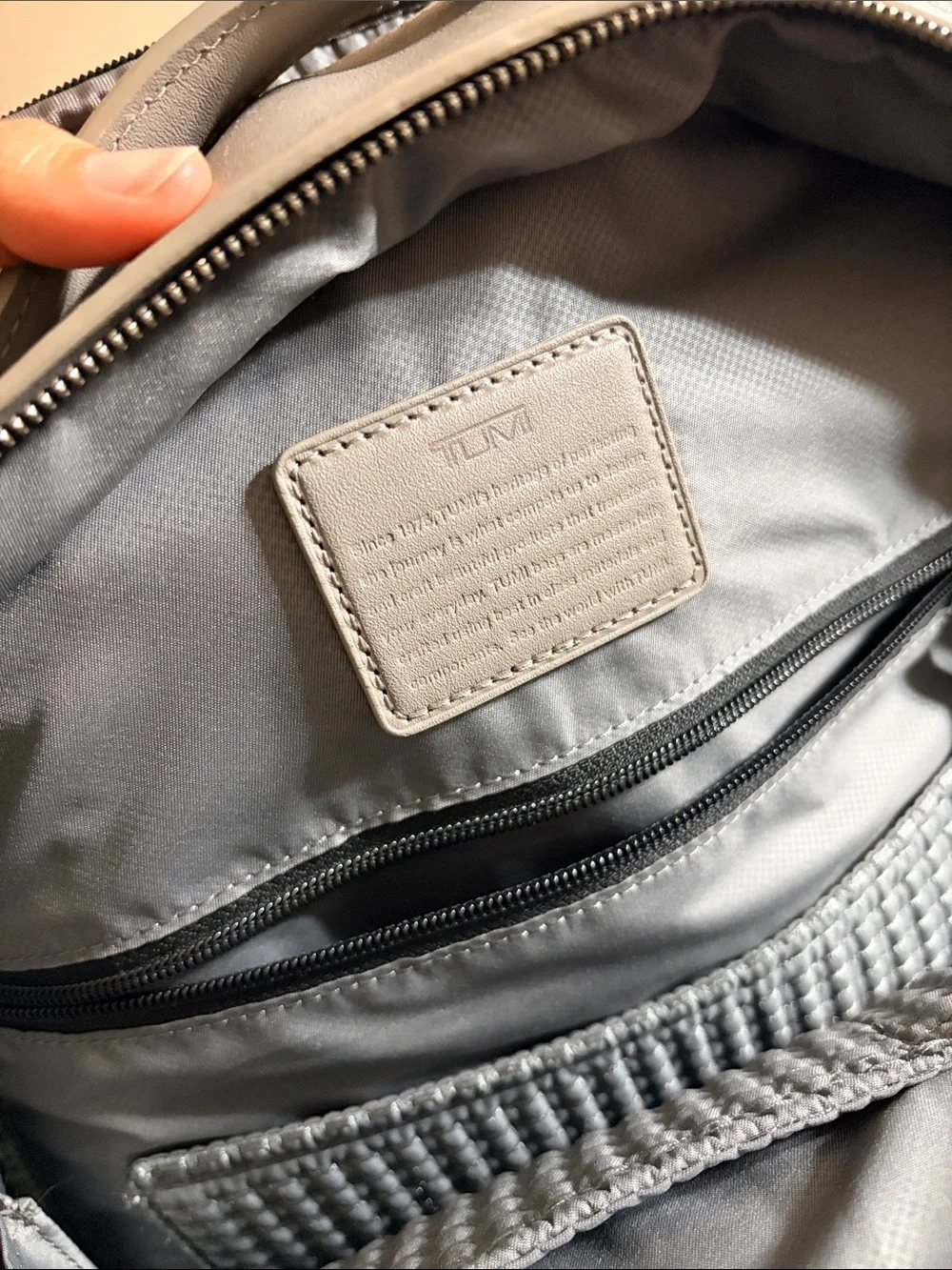 Tumi sleek leather